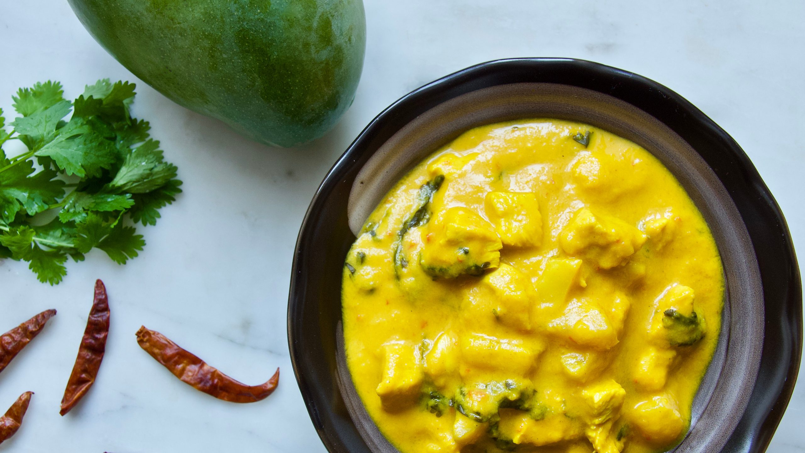 <b>Recept</b> van Indiase chefkok: kruidige viscurry met <b>mango</b> en rijst.